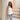 Female wearing a White Solid Color Western Strapless Neckline Top