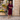 Female wearing a Wine Solid Color   A-Line Style Notched Neckline Cotton Slub Kurta