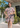 Female wearing a Off-White, Peach Floral Jaal Print Shirt No Neckline Banded Or Stand Collar Dress