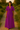Female wearing a Purple Solid Color A-Line V-Neck Neckline Chelsea Collar Dress
