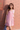 Female wearing a Pink Solid Color Wrap V-Neck Neckline Dress