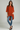 Female wearing a Orange Solid Color   Fusion Style Boat Neckline Cotton Slub Tunic