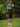 Female wearing a Ferozi Blue Solid Color Western V-Neck Neckline Top