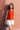 Female wearing a Orange Solid Color Western V-Neck Neckline Shirt Collar Top