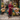 Female wearing a Rust Maroon Solid Color   Panel Style Notched Neckline Cotton Slub Kurta