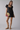 Female wearing a Black Solid Color A-Line Scoop Neckline Dress
