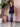 Female wearing a Purple Solid Color   Fusion Style V-Neck Neckline Cotton Slub Tunic