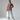 Female wearing a Off White  Color Off White 4 Petal Flowers Print Ethnic Style V-Neck Neckline Cotton Shifli Tunic