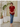 Female wearing a Red Solid Color   Fusion Style V-Neck Neckline Cotton Slub Top