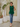 Female wearing a Green Solid Color   Fusion Style Keyhole Neckline Cotton Slub Tunic