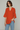 Female wearing a Orange Solid Color   Fusion Style V-Neck Neckline Cotton Slub Tunic