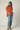 Female wearing a Orange Solid Color   Western Style V-Neck Neckline Cotton Slub Tunic