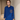 Female wearing a Blue Solid Color Fitted Notched Neckline Pointed Or Barrymore Collar Shirt