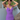 Female wearing a Purple Solid Color A-Line Halterneck Neckline Dress
