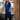 Female wearing a Blue Solid Color A-Line High Neckline Continuous Collar Kurta