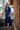 Female wearing a Blue Solid Color A-Line High Neckline Continuous Collar Kurta