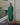 Female wearing a Green Solid Color   Kurta Style Round Neckline Cotton Slub Shirt