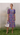 Female wearing a Royal Blue  Color Ikkat Royal Blue Print A-Line Style V-Neck Neckline Cotton Shifli Dress
