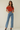 Female wearing a Orange Solid Color   Fusion Style Off The Shoulder Neckline Cotton Slub Top