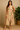 Female wearing a Off-White Sanganeri, Peach Daffodils Butta Print A-Line Round Neckline Round Collar  Dress