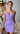 Female wearing a Purple Solid Color Wrap V-Neck Neckline Dress