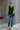 Female wearing a Green Solid Color   Fusion Style V-Neck Neckline Cotton Slub Tunic