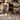 Female wearing a Black Solid Color   Babydoll Style Round Neckline Cotton Slub Dress