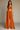 Female wearing a Orange Solid Color   Fusion Style Round Neckline Cotton Slub Top
