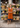 Female wearing a Orange Solid Color   A-Line Style V-Neck Neckline Cotton Slub Dress