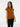 Female wearing a Orange Solid Color   Fusion Style V-Neck Neckline Cotton Slub Top