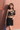 Female wearing a Black Daffodils Print Western One-Shoulder Neckline No Collar Top