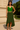 Female wearing a Greenish Rust Solid Color Western V-Neck Neckline Top