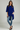 Female wearing a Blue Solid Color   Fusion Style Boat Neckline Cotton Slub Tunic