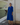 Female wearing a Blue Solid Color   A-Line Style V-Neck Neckline Cotton Slub Dress
