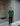 Female wearing a Green Solid Color   Fusion Style Notched Neckline Cotton Slub Tunic