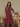 Female wearing a Rust Maroon Solid Color A-Line Kurta