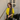 Female wearing a Yellow Solid Color Fusion Round Neckline Mandarin Collar Tunic
