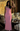 Female wearing a Baby Pink Solid Color A-Line Square Neckline Dress