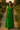 Female wearing a Green Solid Color A-Line V-Neck Neckline Chelsea Collar Dress