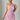 Female wearing a Baby Pink Solid Color Bodycan Asymmetric Neckline Dress