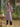 Female wearing a Ash Blue Sanganeri  Red & White Daffodils Print Kurta V-Neckline Neckline No Collar Shirt