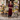 Female wearing a Maroon Solid Color   A-Line Style V-Neck Neckline Cotton Slub Kurta