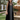 Female wearing a Black Solid Color A-Line Halterneck Neckline No Collar Dress