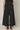 Female wearing a Black Solid Color    Style Cotton Slub Pant