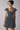 Female wearing a Grey Solid Color A-Line Sweetheart Neckline Dress