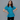 Female wearing a Ferozi Blue Solid Color   Fusion Style Round Neckline Cotton Slub Tunic