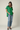 Female wearing a Green Solid Color   Western Style V-Neck Neckline Cotton Slub Tunic