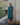 Female wearing a Turquoise Blue Solid Color   Shirt Style Round Neckline Cotton Slub Kurta
