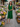 Female wearing a Green Solid Color   A-Line Style V-Neck Neckline Cotton Slub Dress