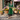 Female wearing a Green Solid Color   A-Line Style Asymmetric Neckline Cotton Slub Kurta